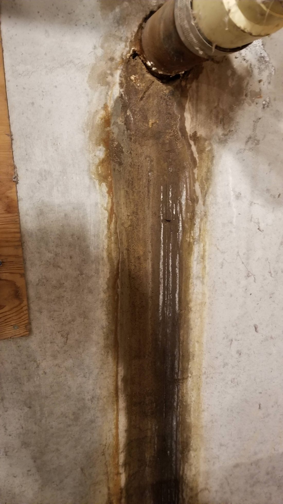 Water staining a wall from a leaking pipe