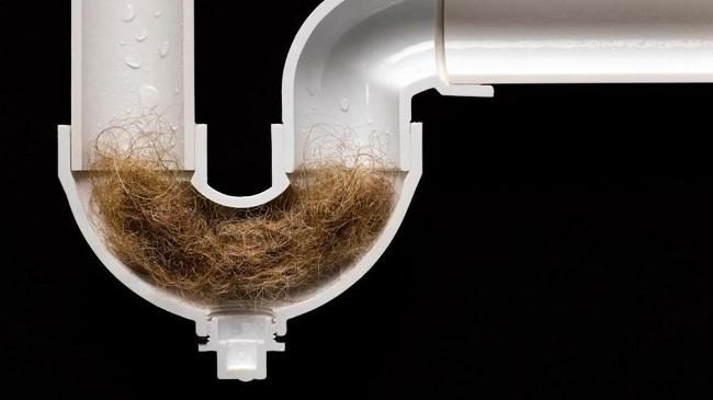 A slow-draining bathroom sink