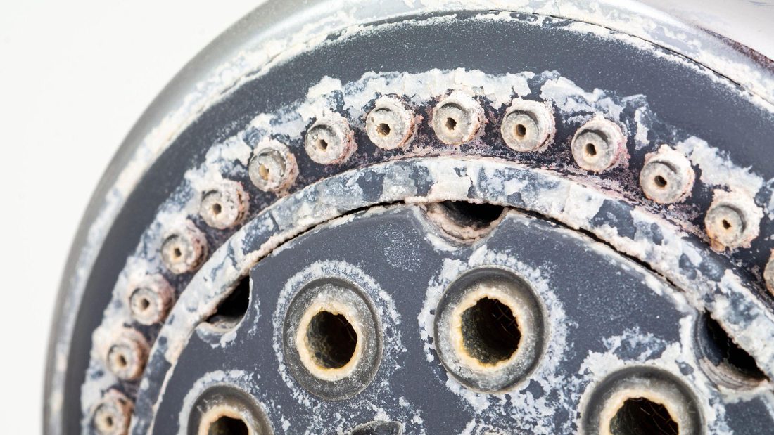 Checking water pressure at a faucet